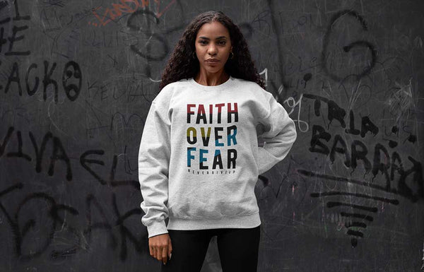 Featuring our Faith Over Fear design, this sturdy and warm sweatshirt is bound to keep you warm in the colder months or during cool evenings. A pre-shrunk, classic fit sweater that's made with air-jet spun yarn for a soft feel and reduced pilling.